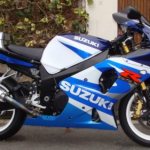 Blue and white coloring of plastic fairings on the first generation Suzuki GSX R1000 bike
